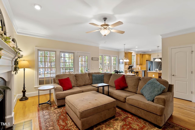 1224 Marshall Farm St, Wake Forest, NC 27587 - living room featuring ceiling fan, light wood-type flooring, ornamental molding, and recessed lighting