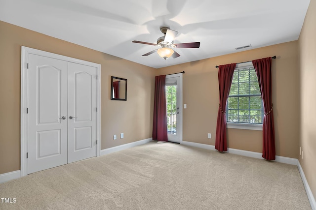 1224 Marshall Farm St, Wake Forest, NC 27587 - unfurnished bedroom with access to exterior, carpet flooring, a closet, and ceiling fan