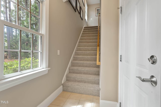 1224 Marshall Farm St, Wake Forest, NC 27587 - staircase with baseboards and tile patterned floors