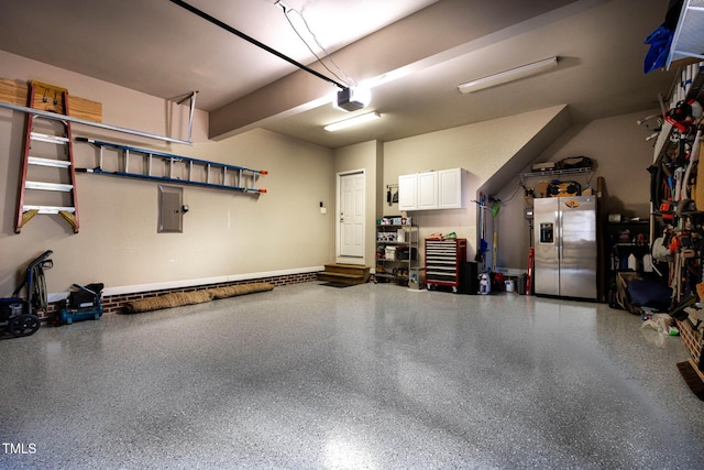 1224 Marshall Farm St, Wake Forest, NC 27587 - garage with stainless steel fridge and electric panel