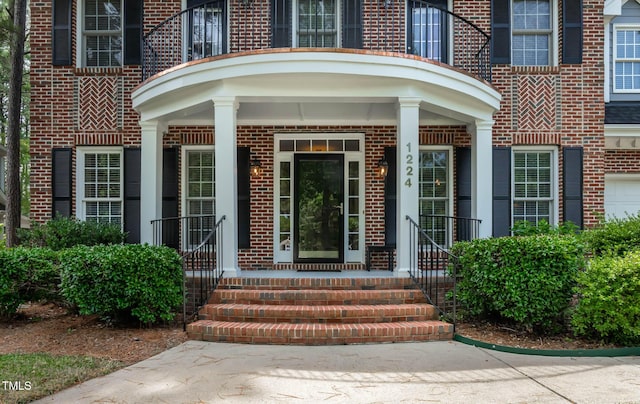 1224 Marshall Farm St, Wake Forest, NC 27587 - view of exterior entry with brick siding and a porch