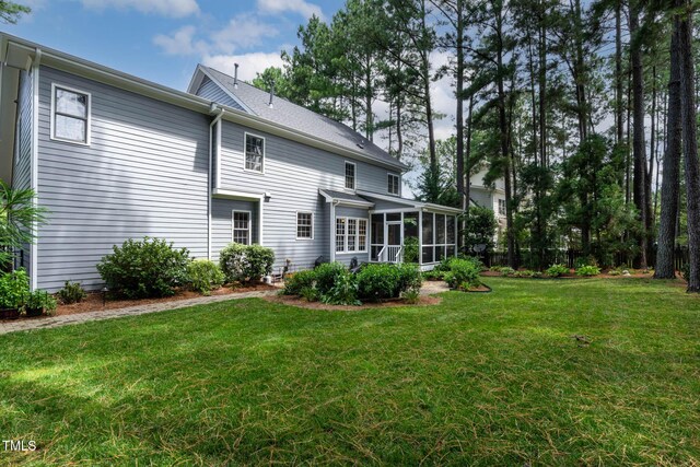 1224 Marshall Farm St, Wake Forest, NC 27587 - rear view of house with a sunroom