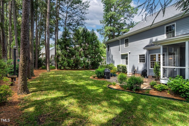 1224 Marshall Farm St, Wake Forest, NC 27587 - view of green lawn with a sunroom and a patio area