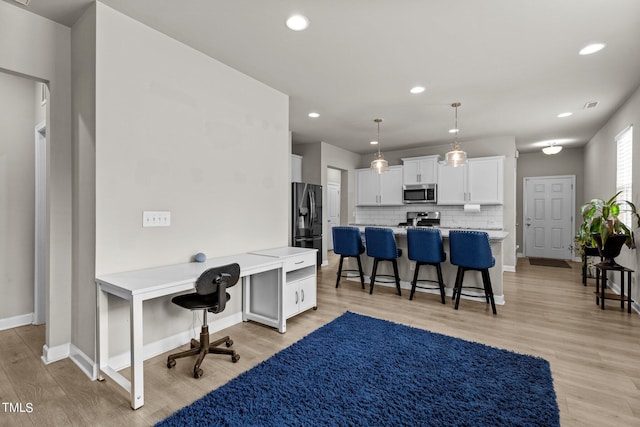 36 Mae Ct, Roxboro, NC 27573 - office area featuring light wood-style flooring and recessed lighting