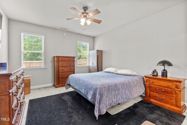 36 Mae Ct, Roxboro, NC 27573 - bedroom featuring light carpet and a ceiling fan