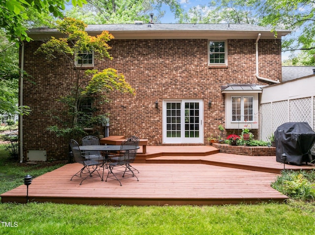 906 Grove St, Chapel Hill, NC 27517 - rear view of property with outdoor dining area, a deck, and brick siding