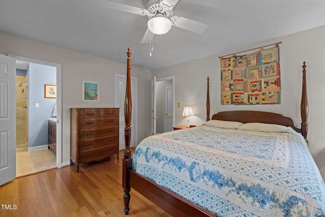 906 Grove St, Chapel Hill, NC 27517 - bedroom featuring light wood finished floors, ensuite bath, and a ceiling fan