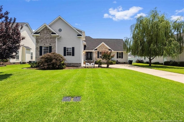 3313 Geyser Peak Rd, Fayetteville, NC 28306 - traditional home with a front lawn and brick siding
