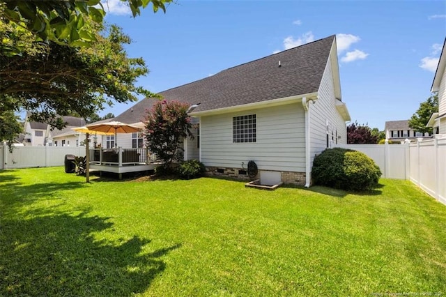 3313 Geyser Peak Rd, Fayetteville, NC 28306 - back of property featuring a fenced backyard, roof with shingles, a deck, and crawl space