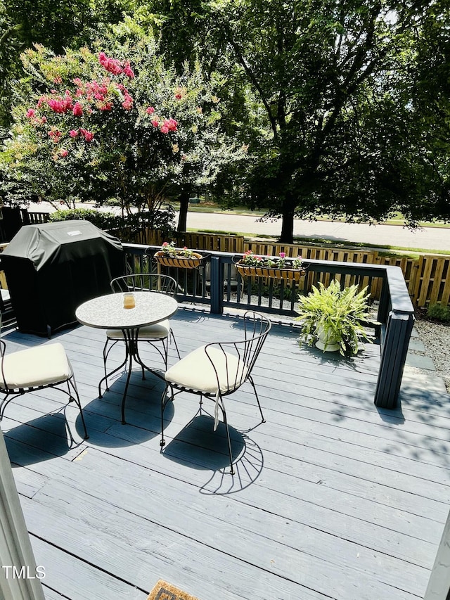 1507 Woodcroft Dr, Raleigh, NC 27609 - wooden deck featuring grilling area