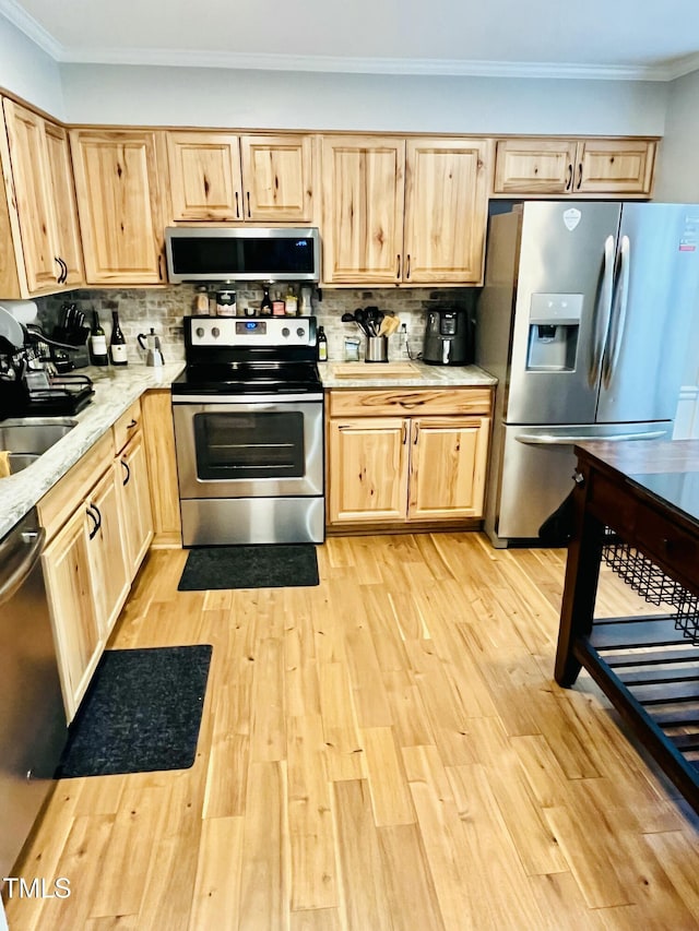 1507 Woodcroft Dr, Raleigh, NC 27609 - kitchen featuring appliances with stainless steel finishes, light brown cabinetry, decorative backsplash, and crown molding