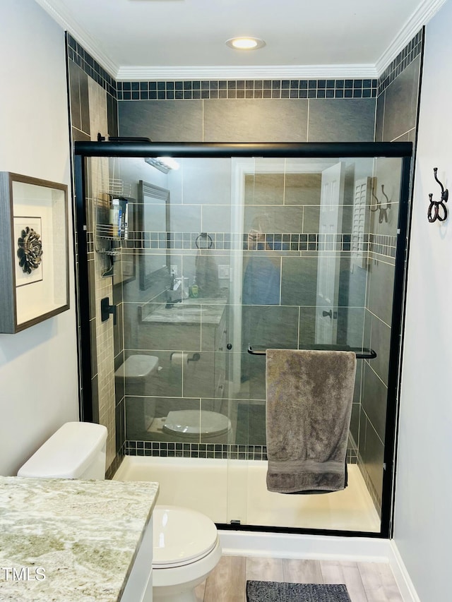 1507 Woodcroft Dr, Raleigh, NC 27609 - bathroom featuring ornamental molding, vanity, and a stall shower