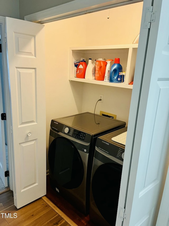 1507 Woodcroft Dr, Raleigh, NC 27609 - laundry room featuring separate washer and dryer and wood finished floors