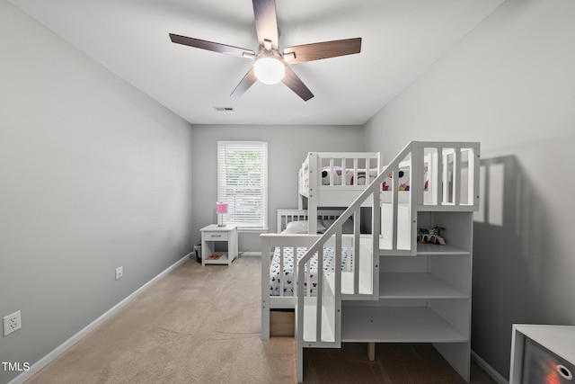 1507 Woodcroft Dr, Raleigh, NC 27609 - stairway with carpet and ceiling fan