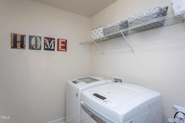 3913 Chapel Oak Dr, Apex, NC 27502 - laundry area featuring independent washer and dryer and baseboards