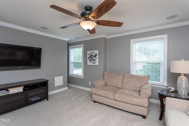 3913 Chapel Oak Dr, Apex, NC 27502 - living area featuring ornamental molding, light colored carpet, and a ceiling fan