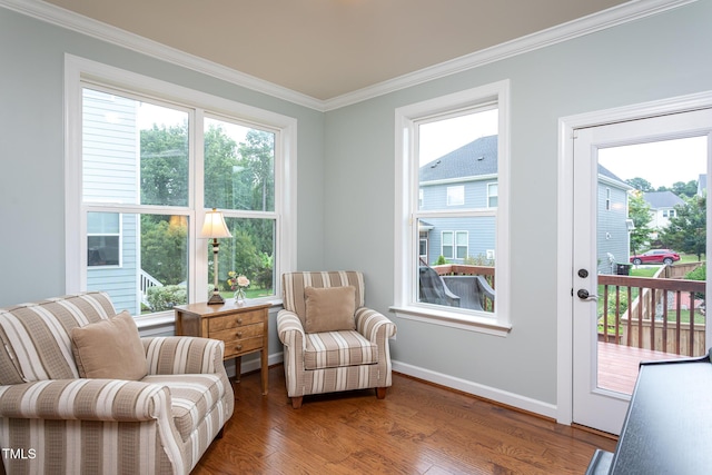 3913 Chapel Oak Dr, Apex, NC 27502 - living area featuring ornamental molding, wood finished floors, and plenty of natural light