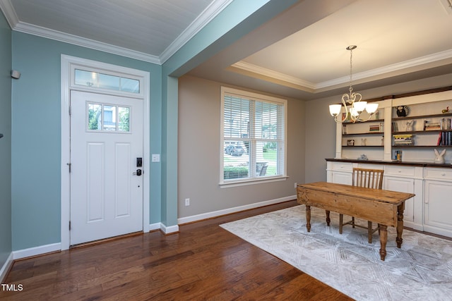 3913 Chapel Oak Dr, Apex, NC 27502 - dining area featuring dark wood finished floors, a chandelier, plenty of natural light, and crown molding