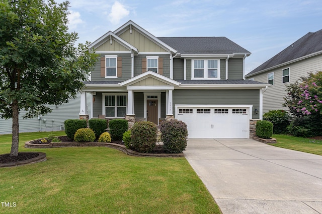 3913 Chapel Oak Dr, Apex, NC 27502 - craftsman house featuring driveway, a garage, board and batten siding, and a front yard