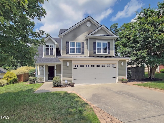 709 Pyracantha Dr, Holly Springs, NC 27540 - view of front of home featuring an attached garage and concrete driveway