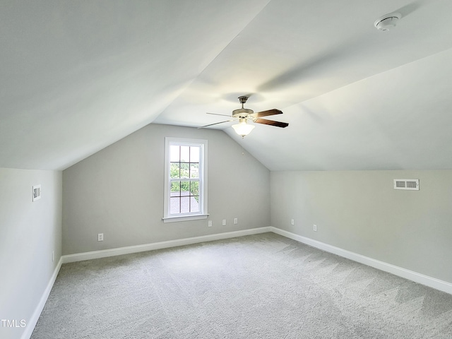 709 Pyracantha Dr, Holly Springs, NC 27540 - bonus room featuring ceiling fan, light carpet, and lofted ceiling