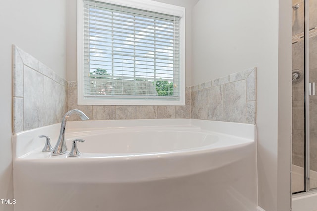 637 Stapleford Ln, Fuquay Varina, NC 27526 - bathroom featuring a bath and a stall shower