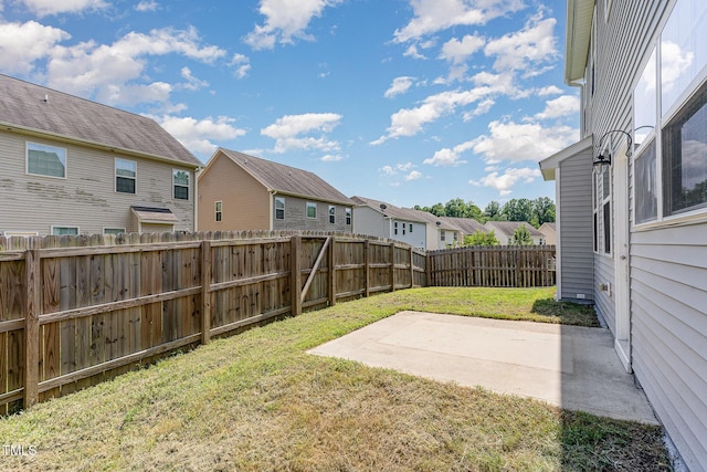 637 Stapleford Ln, Fuquay Varina, NC 27526 - fenced backyard with a residential view and a patio area