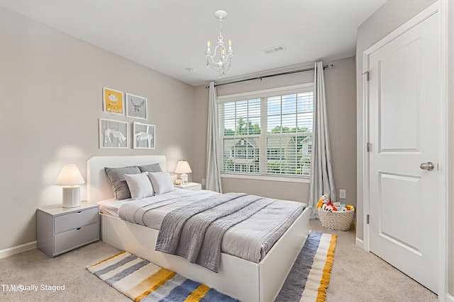 637 Stapleford Ln, Fuquay Varina, NC 27526 - bedroom with light colored carpet and a chandelier