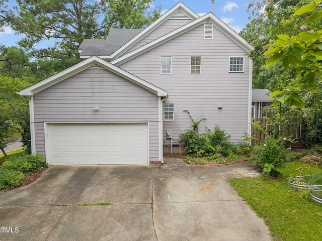 2763 Garland Ct, Creedmoor, NC 27522 - view of side of property with a garage, roof with shingles, and driveway