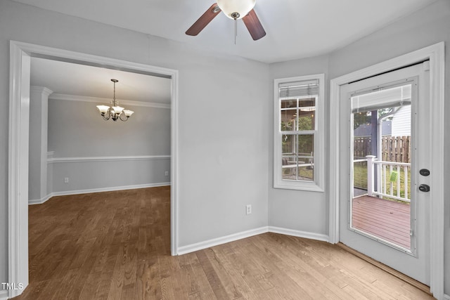 2763 Garland Ct, Creedmoor, NC 27522 - unfurnished room with a chandelier, ceiling fan, and wood finished floors