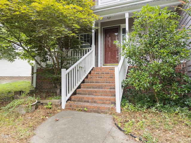 2763 Garland Ct, Creedmoor, NC 27522 - property entrance with a porch