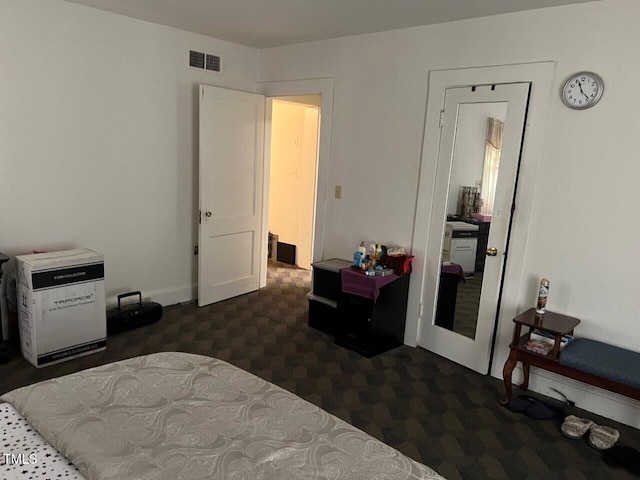 904-906 Mckay Ave, Dunn, NC 28334 - bedroom featuring dark carpet and baseboards