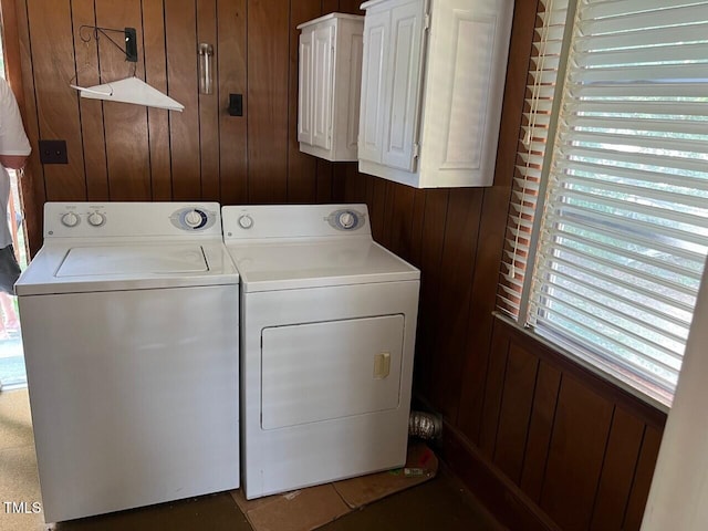 904-906 Mckay Ave, Dunn, NC 28334 - washroom with washing machine and clothes dryer, cabinet space, and wooden walls