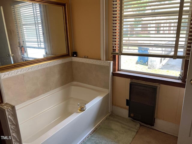 904-906 Mckay Ave, Dunn, NC 28334 - bathroom with plenty of natural light, a bath, and heating unit
