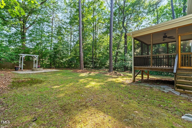 4324 Brighton Ridge Dr, Apex, NC 27539 - view of green lawn featuring a sunroom and ceiling fan