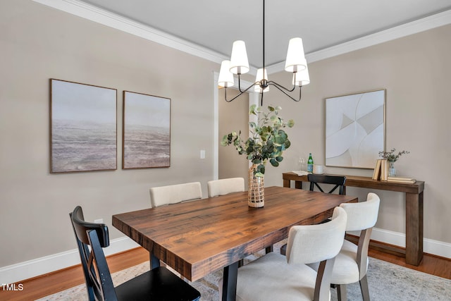 4324 Brighton Ridge Dr, Apex, NC 27539 - dining room featuring a chandelier, wood finished floors, and crown molding