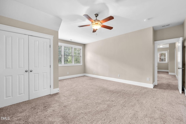 4324 Brighton Ridge Dr, Apex, NC 27539 - unfurnished bedroom with carpet, a closet, and ceiling fan