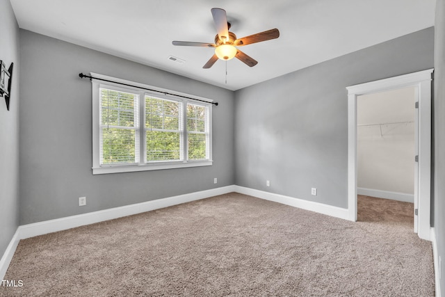 4324 Brighton Ridge Dr, Apex, NC 27539 - carpeted empty room with a ceiling fan and baseboards