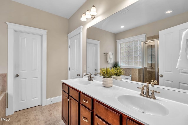 4324 Brighton Ridge Dr, Apex, NC 27539 - full bathroom featuring double vanity, tiled shower, and a tub to relax in