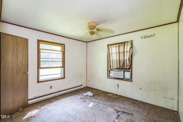 1141 Morgan Rd, Henderson, NC 27537 - unfurnished room featuring baseboard heating, cooling unit, ceiling fan, and wood walls