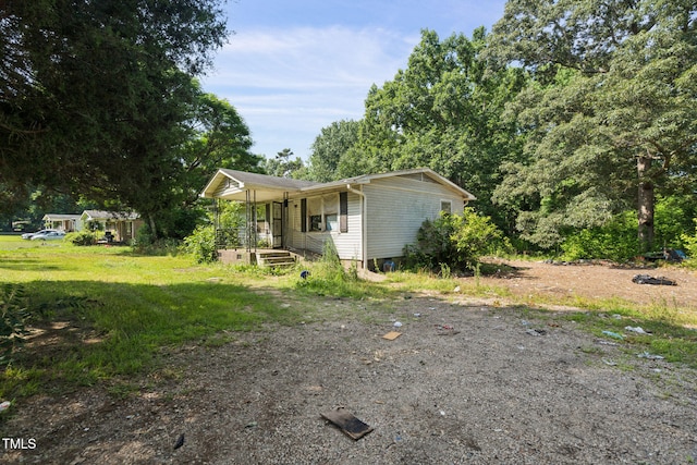 1141 Morgan Rd, Henderson, NC 27537 - view of front of house with a front lawn
