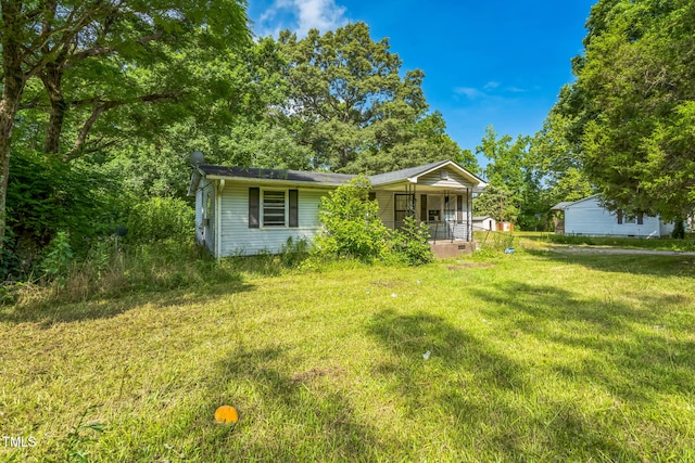 1141 Morgan Rd, Henderson, NC 27537 - view of front of property featuring covered porch and a front lawn