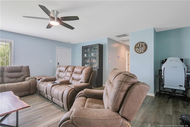1214 Herring Gull Dr, Fayetteville, NC 28306 - living area featuring wood finished floors and a ceiling fan