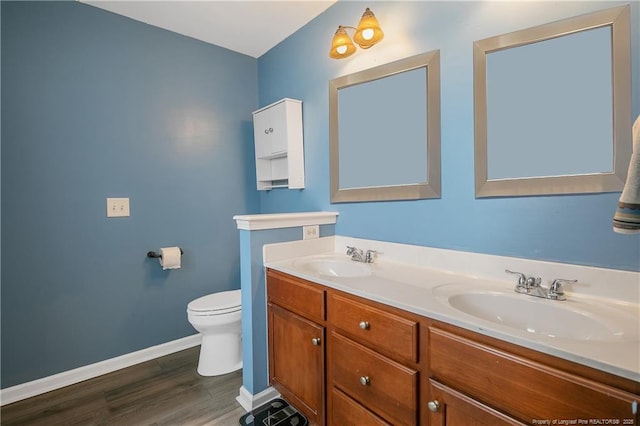 1214 Herring Gull Dr, Fayetteville, NC 28306 - bathroom with double vanity and wood finished floors