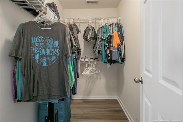 1214 Herring Gull Dr, Fayetteville, NC 28306 - walk in closet featuring wood finished floors