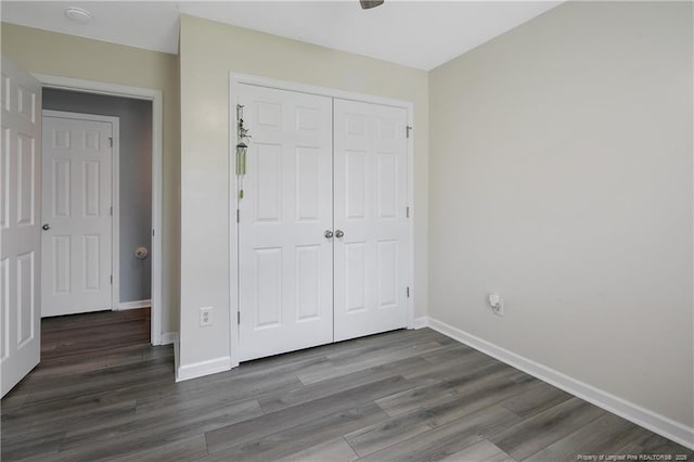 1214 Herring Gull Dr, Fayetteville, NC 28306 - unfurnished bedroom featuring wood finished floors and a closet