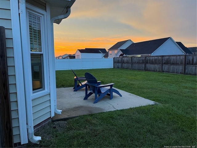 1214 Herring Gull Dr, Fayetteville, NC 28306 - fenced backyard with a patio