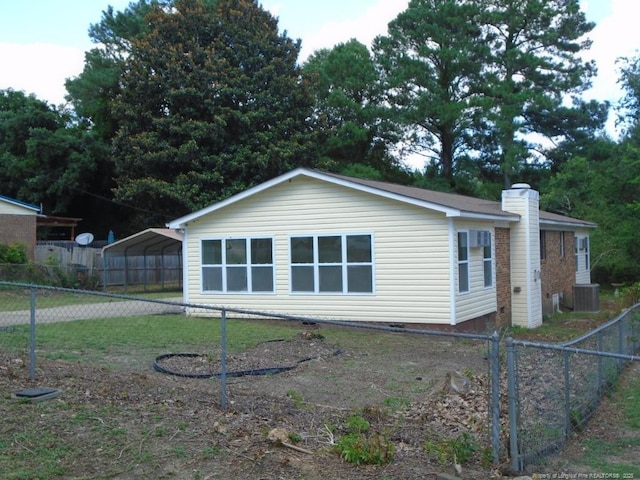 2631 Stonehaven Dr, Fayetteville, NC 28306 - view of property exterior with a carport, a chimney, and crawl space