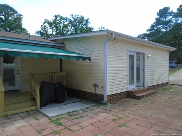 2631 Stonehaven Dr, Fayetteville, NC 28306 - rear view of house with entry steps and a patio