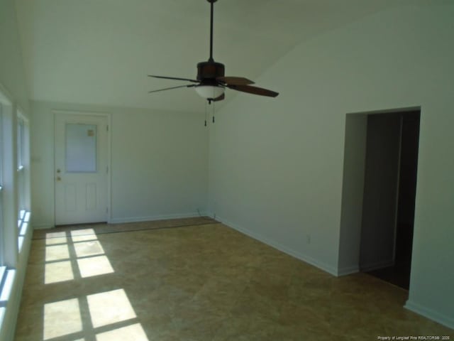 2631 Stonehaven Dr, Fayetteville, NC 28306 - spare room with lofted ceiling and a ceiling fan